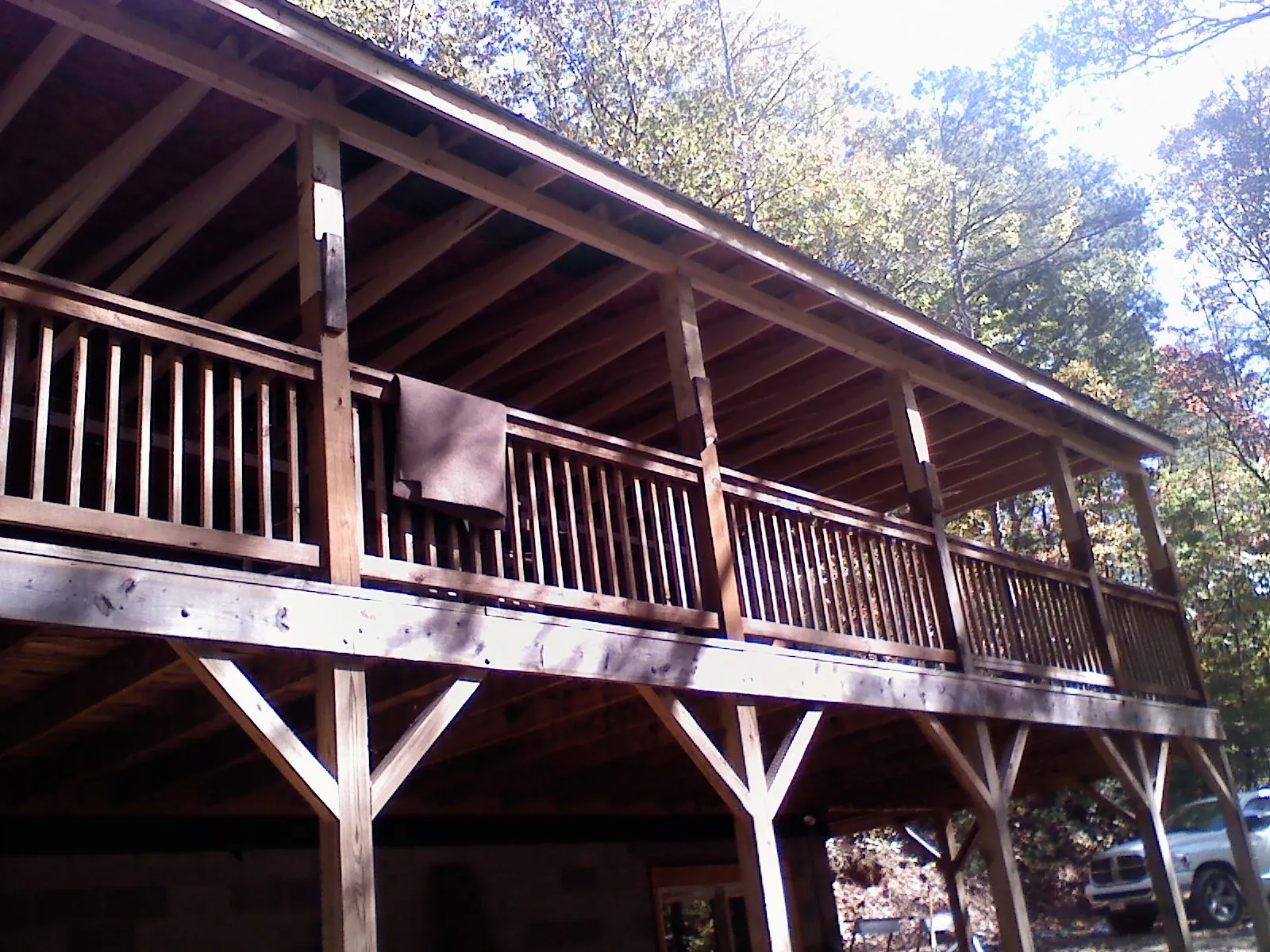 Timber framing under a new elevated porch and deck — Roof Leak Repair in Grinnell by Roofing Brothers